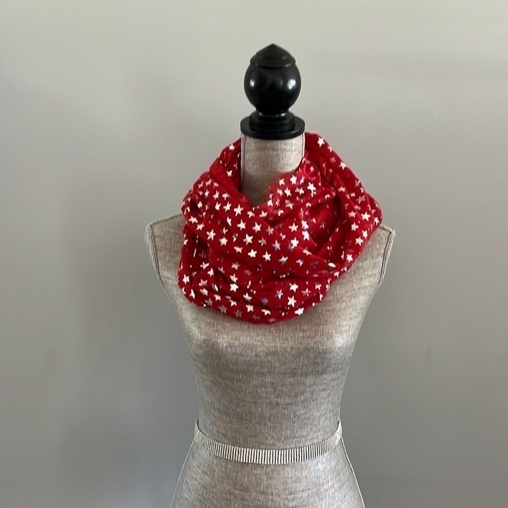 Infinity scarf in red with silver stars with distressed hem. Super festive.
